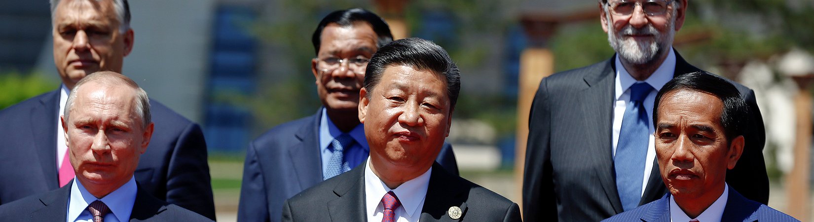 Xi urges world to reject protectionism as he promotes belt and road trade initiative