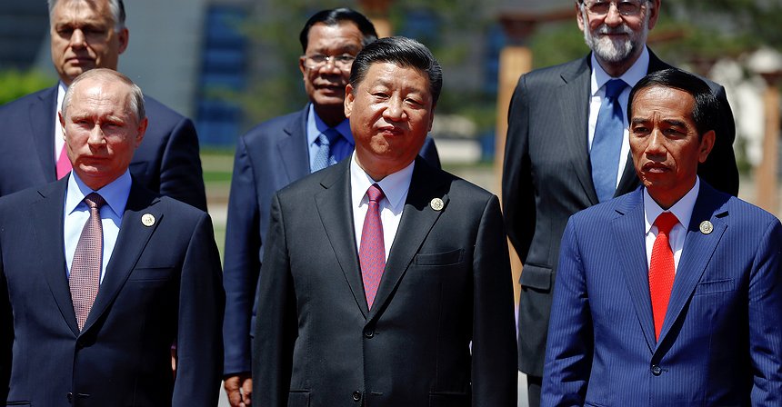 Xi urges world to reject protectionism as he promotes belt and road trade initiative