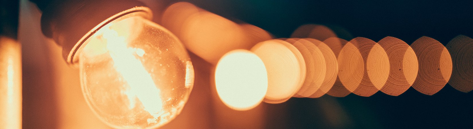 Blockchain in Electricity: From Microgrids to Macrodreams