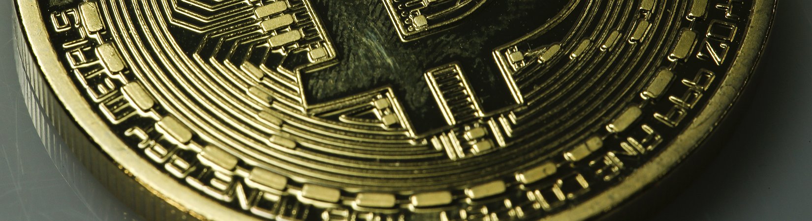Hacker rubano 65 milioni di dollari in bitcoin, crolla la criptovaluta