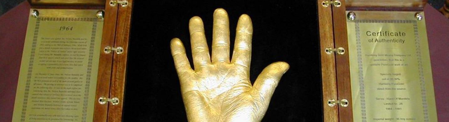 Gold Casts of Mandela's Hands Sell for $10m in Bitcoin