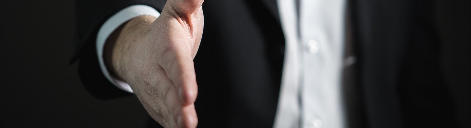 Cardano's Founder Shows Interest in Buying CoinDesk